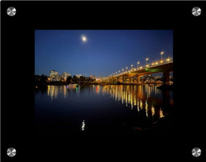 Cambie Bridge in Vancouver at night under the moonlight